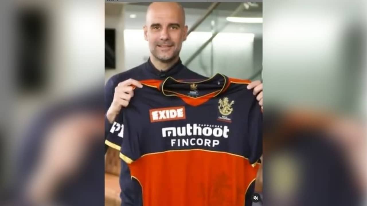 ক্রিকেটের নিয়ম শিখতে চাই, বিরাটের জার্সি হাতে বললেন গুয়ার্দিওলা