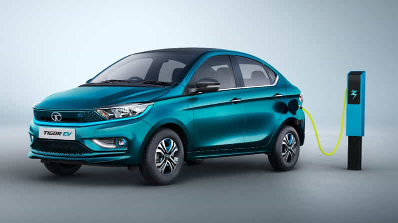 টাটা টিগর ইভি (Tata Tigor EV) - দেশি চারচাকা গাড়ি প্রস্তুতকারক সংস্থা টাটাও একটি ইলেকট্রিক গাড়ি নিয়ে হাজির হয়েছিল বেশ কিছু দিন আগেই। দেশের বাজারে কম খরচে অত্যন্ত জনপ্রিয় হয়েছে গাড়িটি। মাত্র ১১.৯৯ লাখ টাকা খরচ করলেই আপনি পেয়ে যাবেন একটি টাটা টিগর ইভি। এই মুহূর্তে ভারতে অন্যতম সস্তার ইলেকট্রিক ভেহিকল এই টাটা টিগর ইভি।