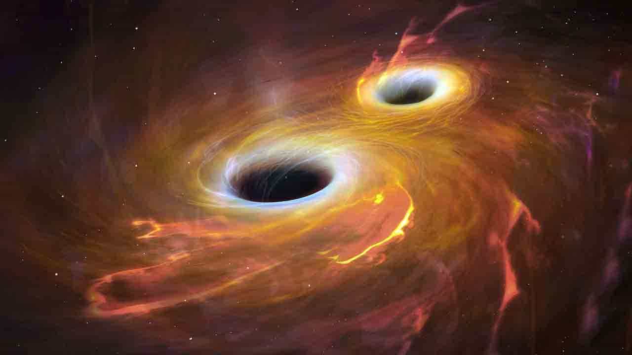 Black Holes: একজোড়া সুপারম্যাসিভ ব্ল্যাক হোল খুঁজে পেয়েছেন জ্যোতির্বিজ্ঞানীরা, পৃথিবীর সবচেয়ে কাছে এর অবস্থান Black Holes: একজোড়া সুপারম্যাসিভ ব্ল্যাক হোল খুঁজে পেয়েছেন জ্যোতির্বিজ্ঞানীরা, পৃথিবীর সবচেয়ে কাছে এর অবস্থান