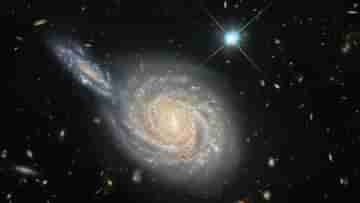 Colliding Galaxies: ছায়াপথের সংঘর্ষ! একটি গ্যালাক্সির মধ্যে ডুবে যাচ্ছে আর একটি! আসল রহস্য জানাল নাসা