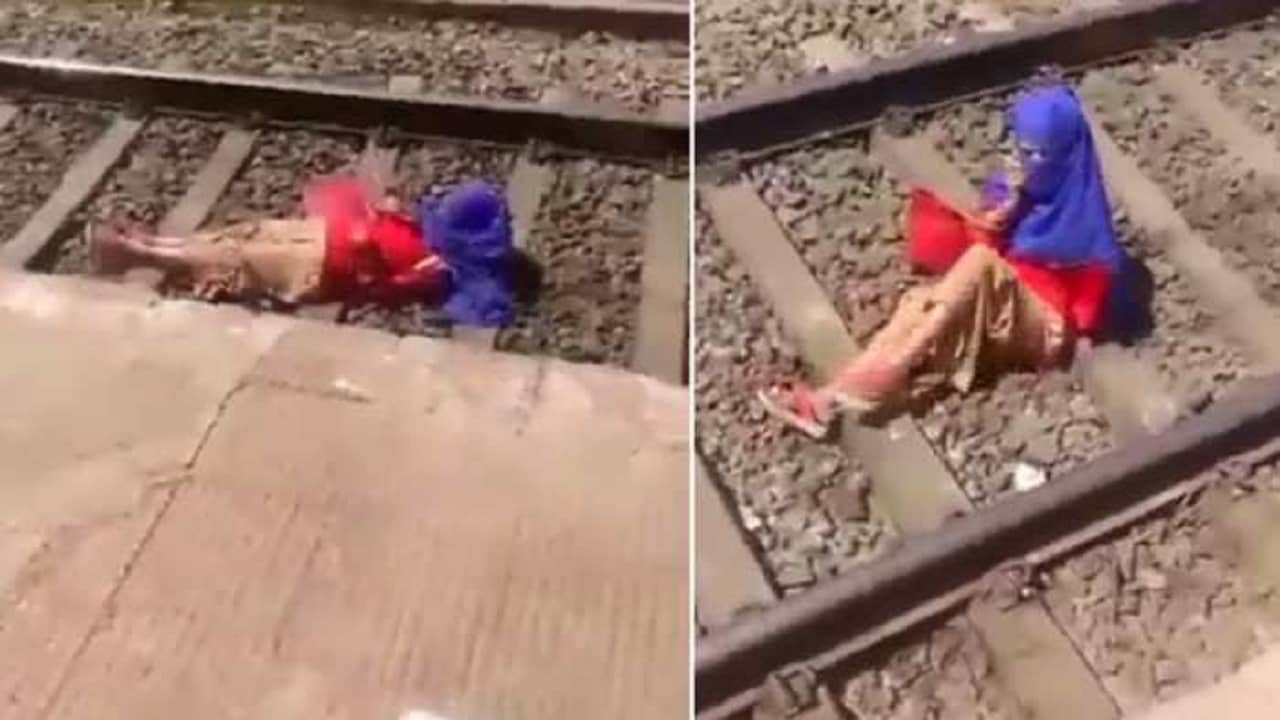 Viral Video: ফোনে কথা বলছিলেন, ট্রেন আসতেই রেলওয়ে ট্র্যাকে শুয়ে পড়লেন, ট্রেন চলে গেল, কিসসু হল না!