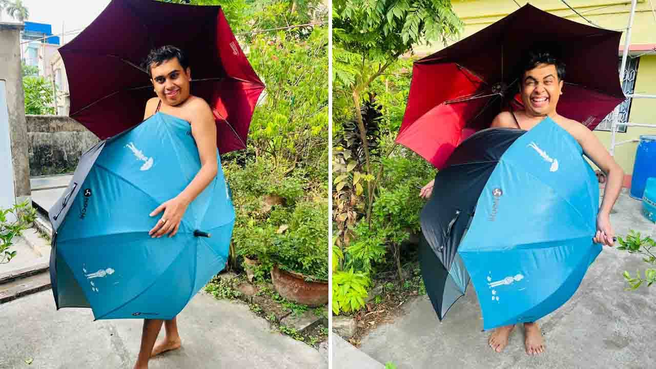 Sandy Saha: ‘অ্যামব্রেলা’ বিতর্কে নিজেকেই ছাতায় মুড়ে ফেললেন স্যান্ডি সাহা; ‘জোকারের মতো লাগছে’, প্রতিক্রিয়া নেটিজ়েনদের