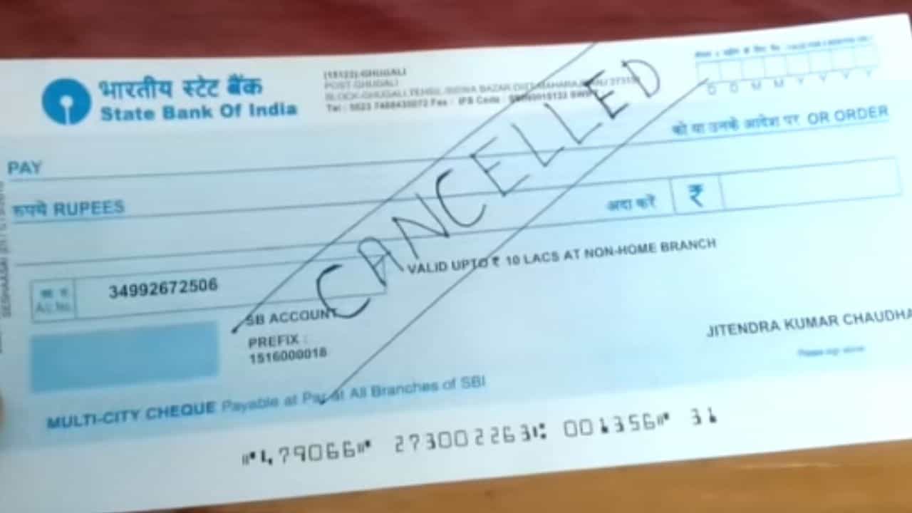 Cheque Book Sign: Cancelled Cheque লেখার আগে সাবধান! বিপাকে পড়তে পারেন Cheque Book Sign: Cancelled Cheque লেখার আগে সাবধান! বিপাকে পড়তে পারেন