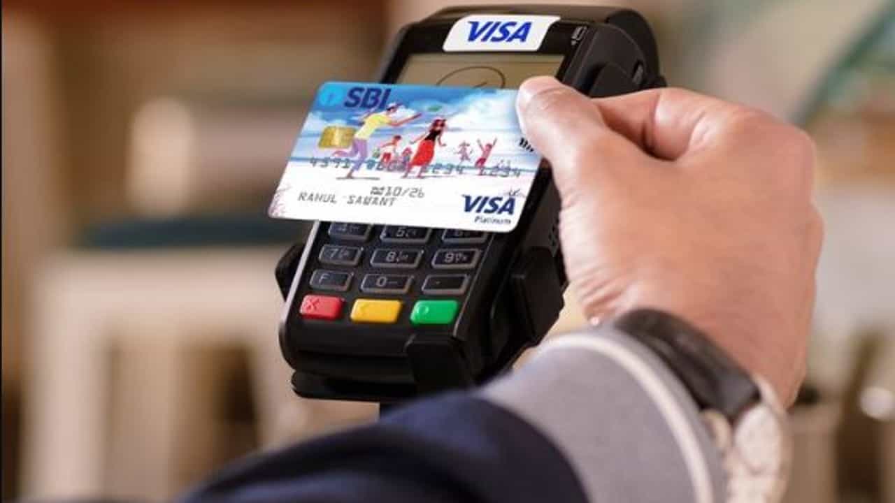 SBI Contactless Card Transaction: কার্ড না ছুঁইয়েই করা যাবে পেমেন্ট, SBI-এর নয়া সুবিধা পাবেন কীভাবে? জানুন বিস্তারিত SBI Contactless Card Transaction: কার্ড না ছুঁইয়েই করা যাবে পেমেন্ট, SBI-এর নয়া সুবিধা পাবেন কীভাবে? জানুন বিস্তারিত