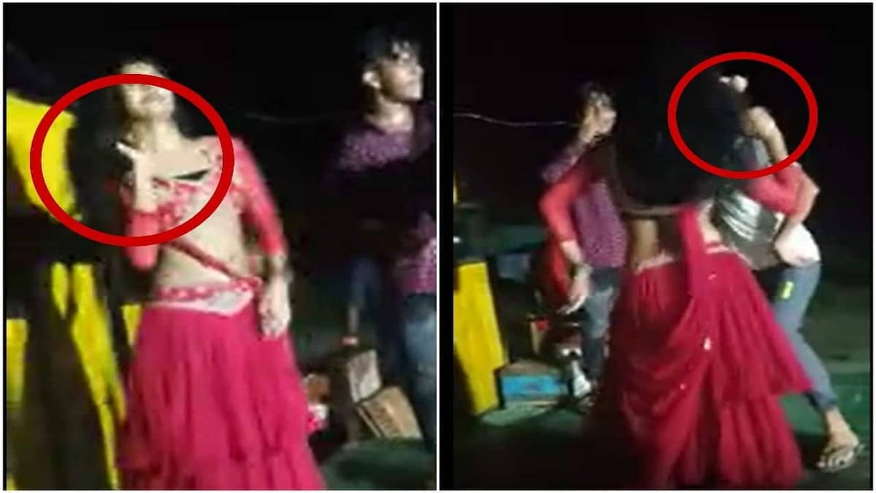 Woman Dancing With Gun: পিস্তল হাতে মঞ্চে নৃত্যরত মহিলা, পুরুষরা সামনে আসতেই দেখালেন ভয়...