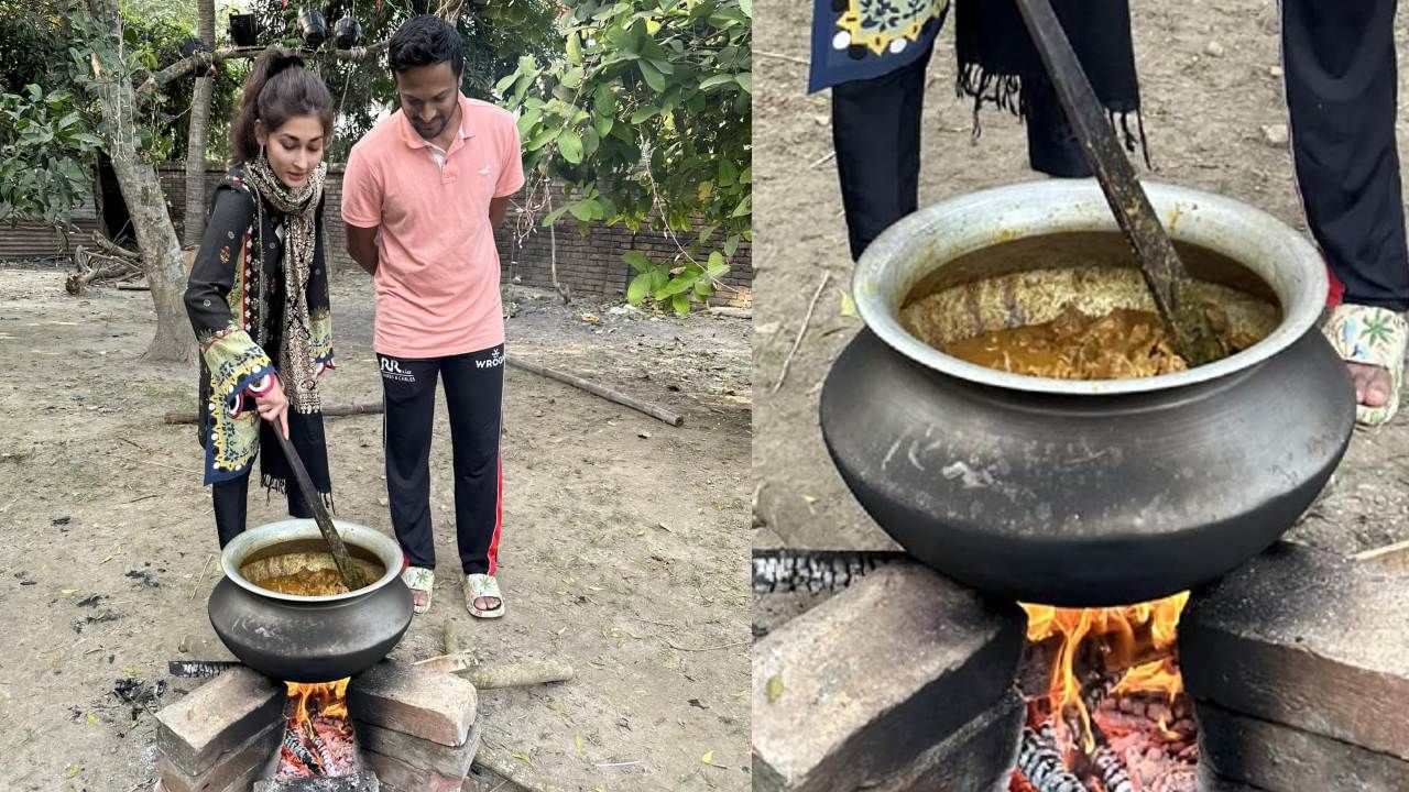 কালো কামিজ পরনের রান্নায় ব্যস্ত সাকিবের স্ত্রী উম্মে আহমেদ শিশির। কাঠের আগুনের ধোঁয়ার মাঝেও স্ত্রীর পাশে দাঁড়িয়ে সাকিব। আদর্শ স্বামীর মতো স্ত্রীকে রান্নায় সাহায্য করছেন ক্যাপ্টেন বাংলাদেশ।(ছবি:ফেসবুক)  