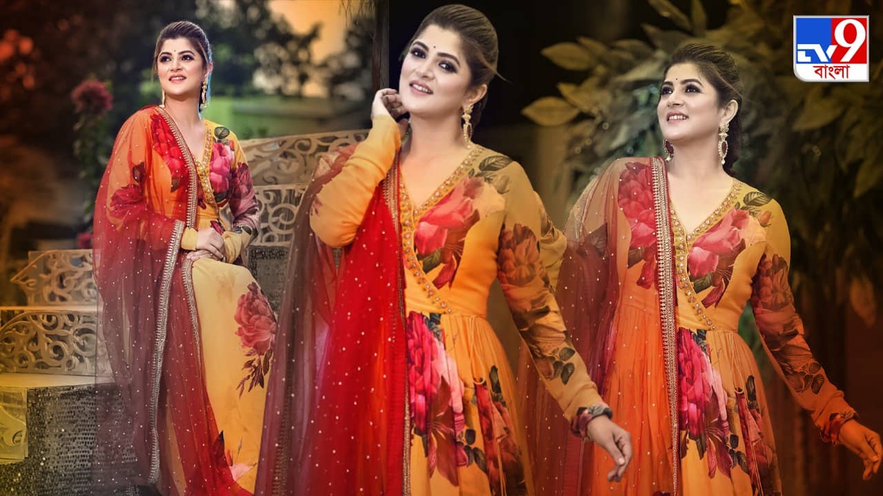 Srabanti Chatterjee: হলুদ রঙের ফ্লোরাল আংরাখায় উজ্জ্বল শ্রাবন্তী, খামখেয়ালী মেঘ বন্দি তাঁর হাসিতেই