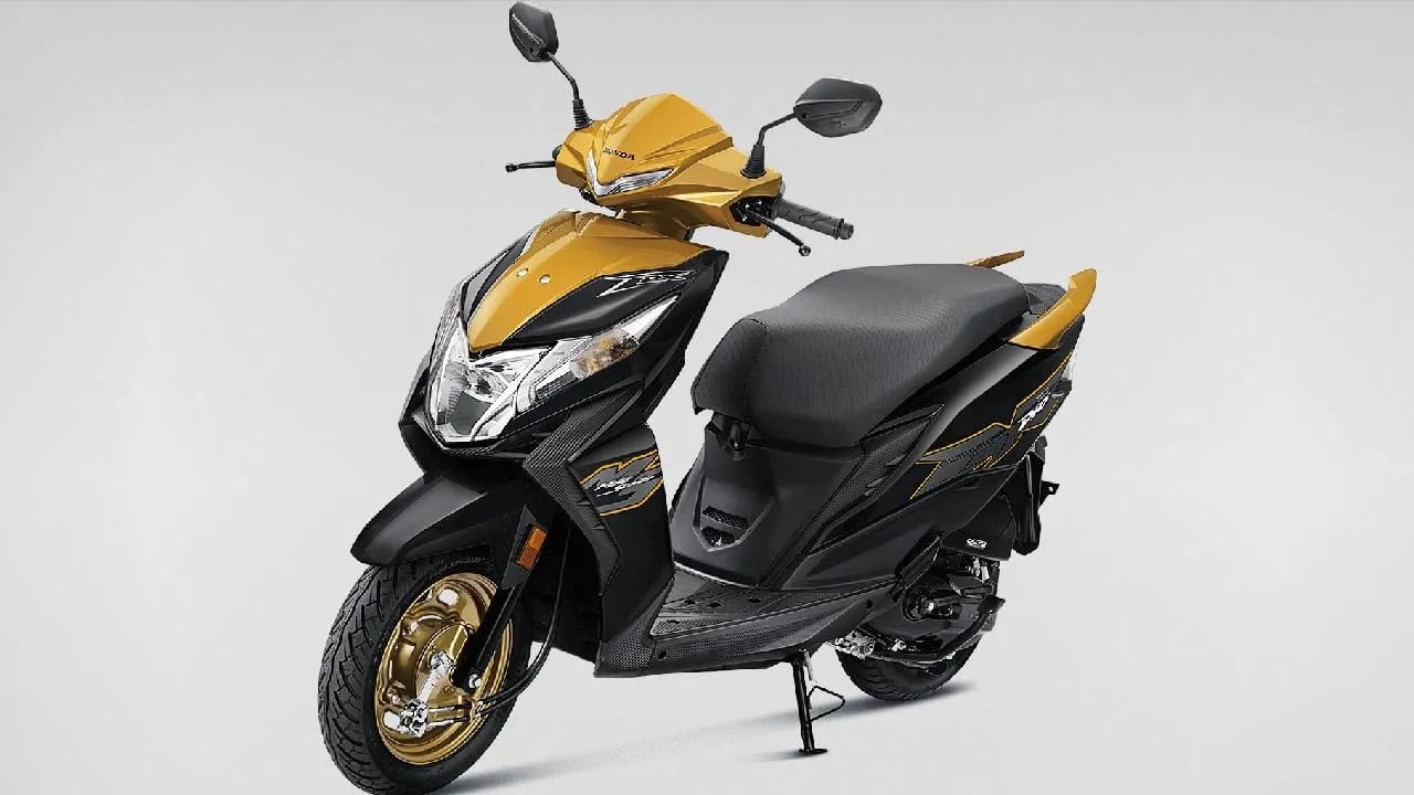 Honda Dio H-Smart: সস্তায় নতুন স্কুটার বাজারে আনল Honda, এত কম দামে স্মার্ট কী-এর সুবিধা Honda Dio H-Smart: সস্তায় নতুন স্কুটার বাজারে আনল Honda, এত কম দামে স্মার্ট কী-এর সুবিধা