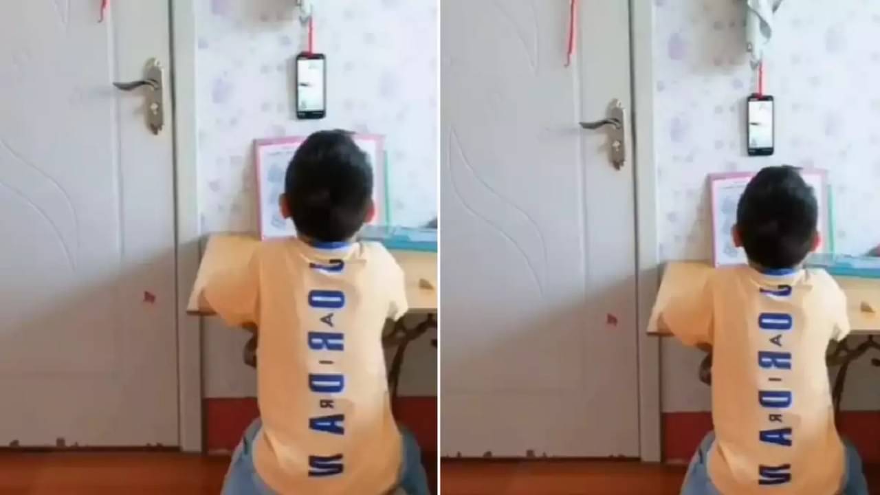 Viral Video: মোবাইল দেখার অসামান্য কৌশল! মা এসে দেখল, মন দিয়ে পড়াশোনা করছে ছেলে, এদিকে...