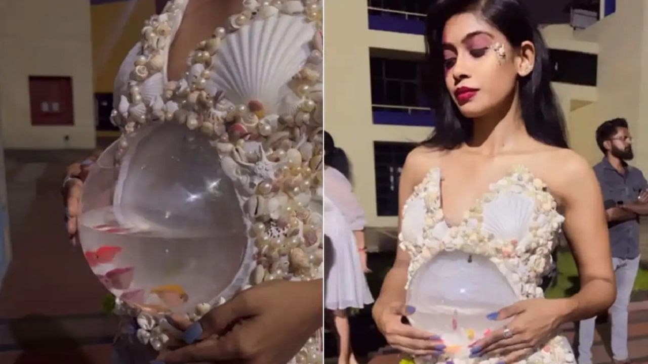 Viral Video: মডেলের আজব পোশাক, পেটের কাছে আস্ত অ্যাকোয়ারিয়াম, কিলবিল করছে মাছ Viral Video: মডেলের আজব পোশাক, পেটের কাছে আস্ত অ্যাকোয়ারিয়াম, কিলবিল করছে মাছ