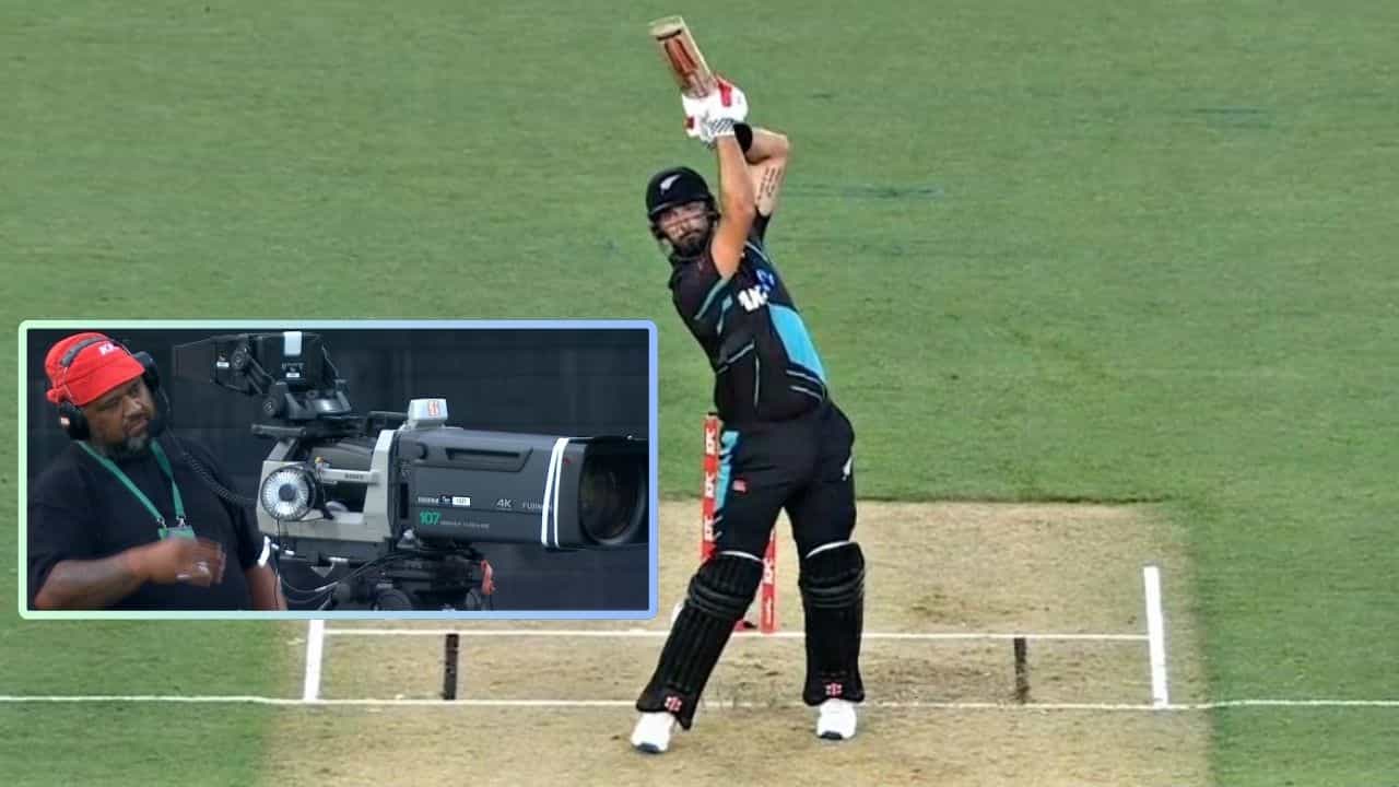 Daryl Mitchell: মিচেলের ছক্কায় ভাঙল ক্যামেরা, তা দেখে বাবর দৌড়ে গিয়ে যা করলেন... Daryl Mitchell: মিচেলের ছক্কায় ভাঙল ক্যামেরা, তা দেখে বাবর দৌড়ে গিয়ে যা করলেন...