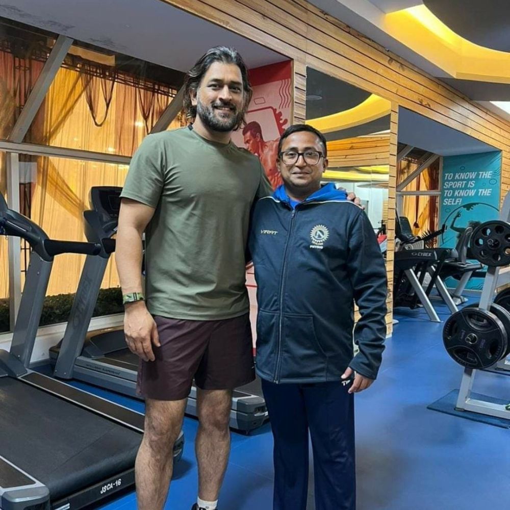 MS Dhoni with a a fan