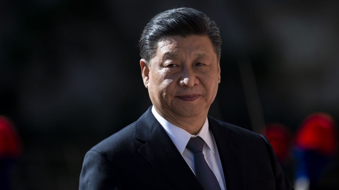 Xi Jinping: গেল কোথায় চিনা দেশভক্তরা? আইনের নাগপাশে নাগরিকদের বাঁধছেন শি জিনপিং