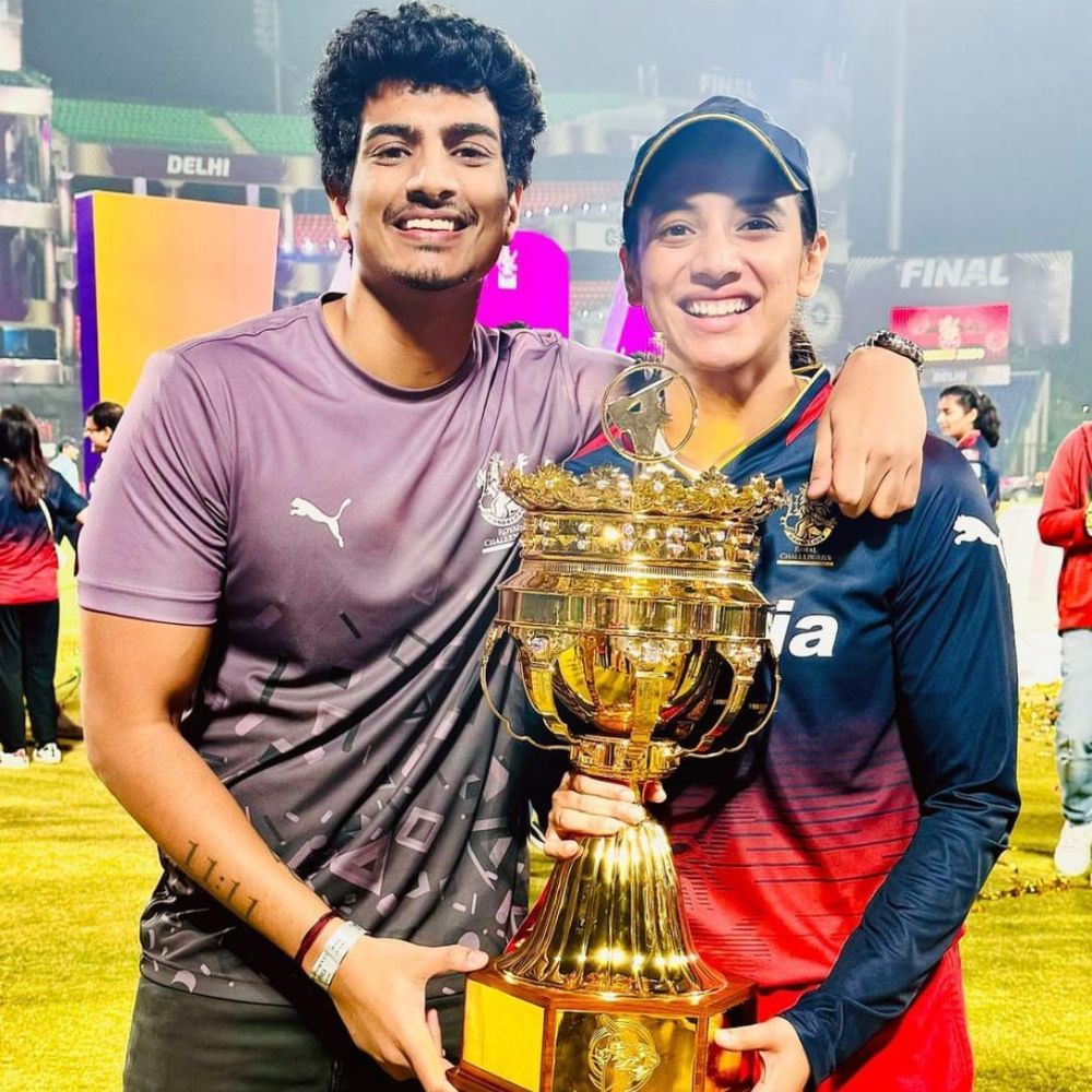 Smriti and Palash with WPL trophy