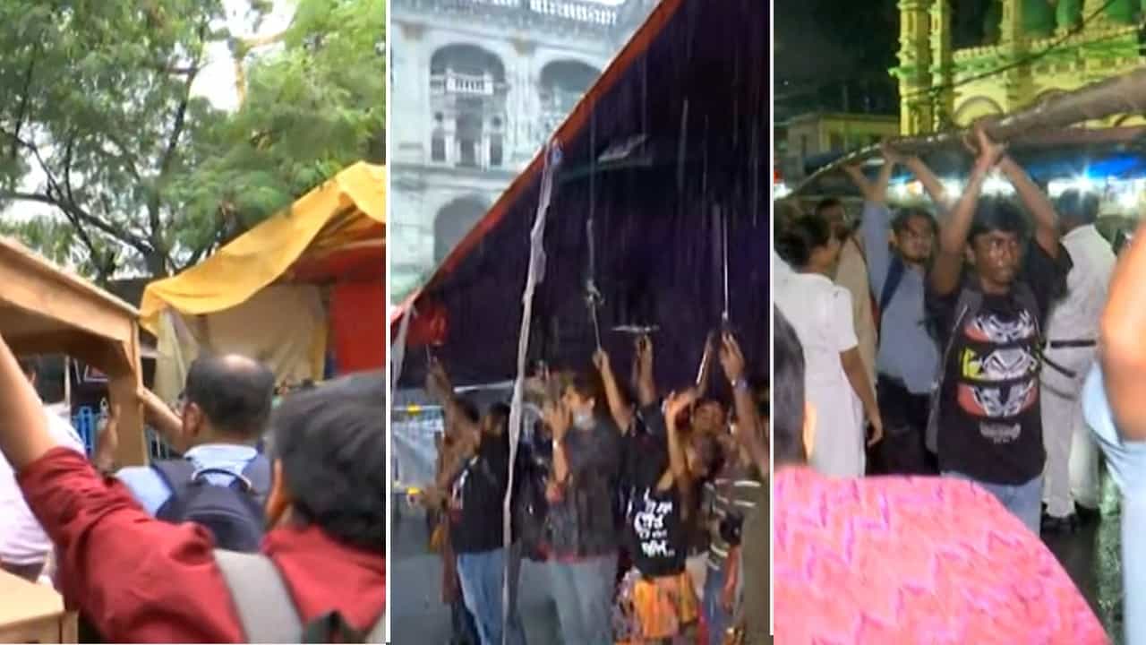 Doctor's Protest: বৃষ্টিতে ভাঙল ডাক্তারদের ছাউনি, ডেকরেটর্সকে 'বাধা' পুলিশের, বাঁশবাহী টেম্পো সিগন্যালে দাঁড় করানোর চেষ্টা, ধর্মতলায় সাধারণ মানুষই হাতে করে সব পৌঁছে দিলেন চিকিৎসকদের Doctor's Protest: বৃষ্টিতে ভাঙল ডাক্তারদের ছাউনি, ডেকরেটর্সকে 'বাধা' পুলিশের, বাঁশবাহী টেম্পো সিগন্যালে দাঁড় করানোর চেষ্টা, ধর্মতলায় সাধারণ মানুষই হাতে করে সব পৌঁছে দিলেন চিকিৎসকদের