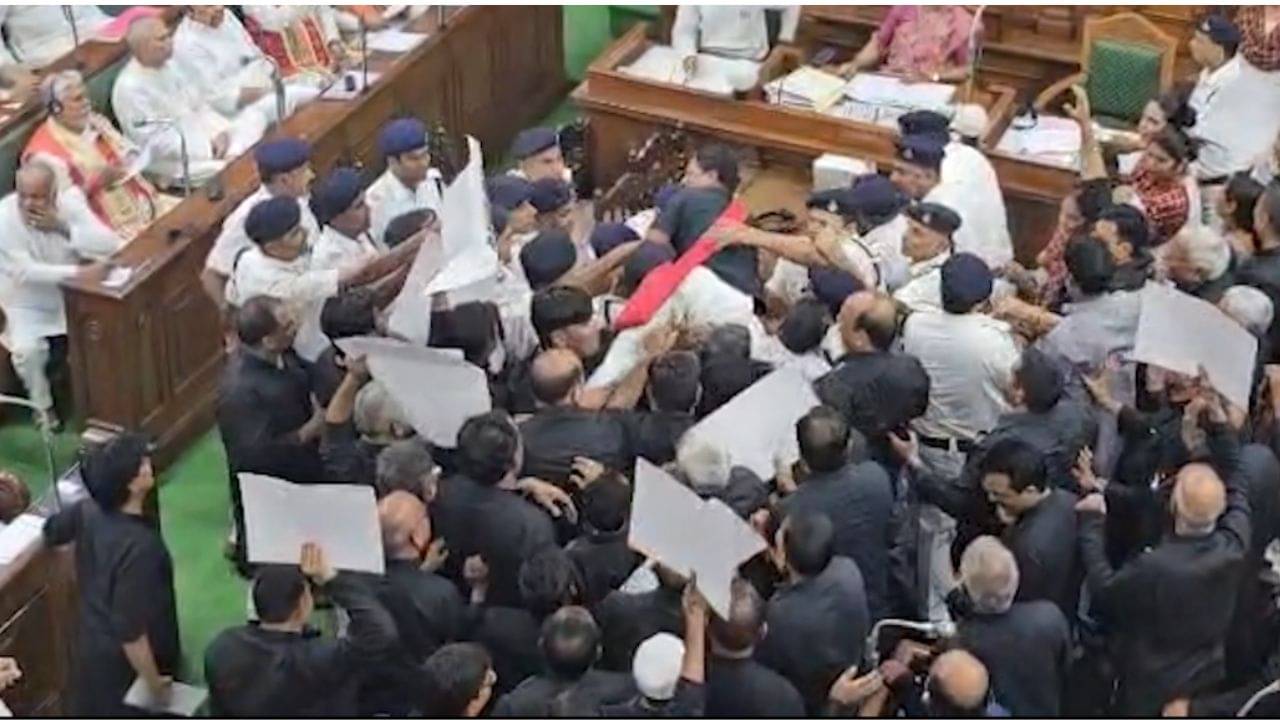 Chaos in assembly: বিধানসভায় মার্শালের কাঁধে উঠে পড়লেন বিধায়ক, ভোটের আগে ধুন্ধুমার কাণ্ড