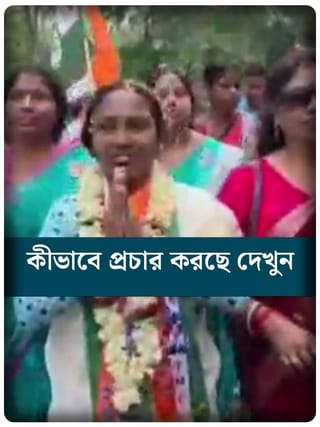 বৃষ্টির পরোয়া নেহি! প্রচারে তৃণমূল প্রার্থী