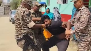 টেনে হিঁচড়ে বের করছে বাহিনী, দেখুন সেই ‘অ্যাকশন’