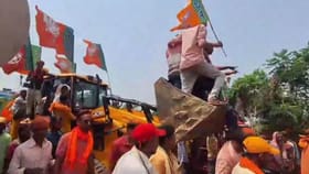 বুলডোজার নিয়ে এসে তার উপর চড়ে সেলিব্রেট করল BJP