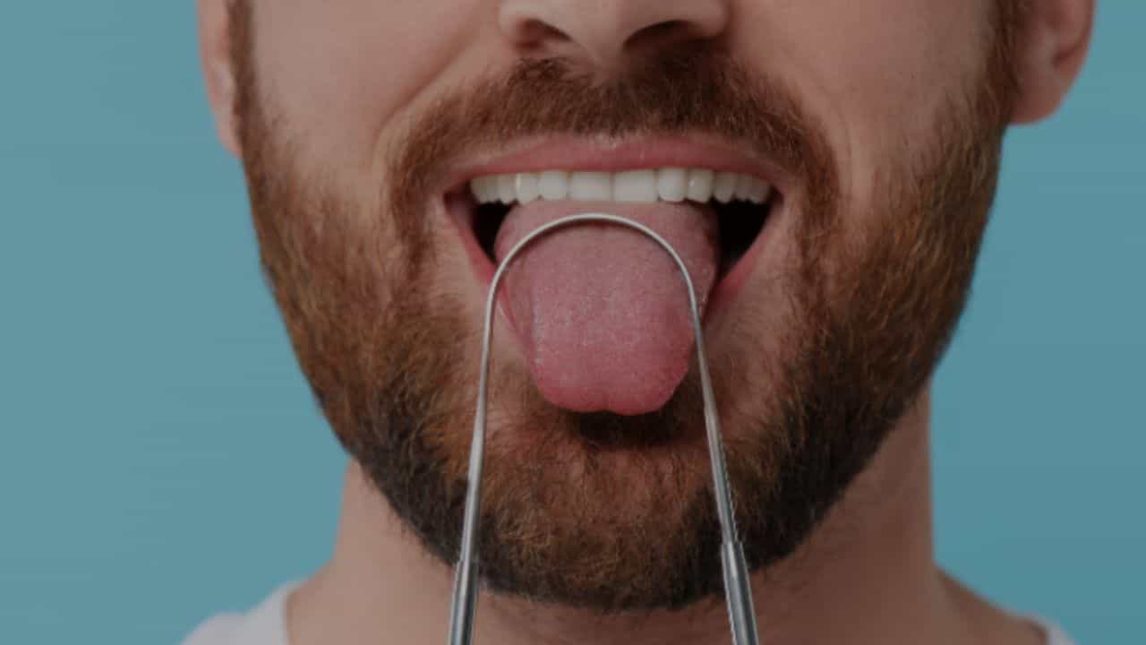 How To Clean Tongue: লাগবে না ‘জিভছোলা’, এই সহজ ঘরোয়া টোটকাতেই জিভের সাদা সাদা ময়লা দূর করুন How To Clean Tongue: লাগবে না ‘জিভছোলা’, এই সহজ ঘরোয়া টোটকাতেই জিভের সাদা সাদা ময়লা দূর করুন