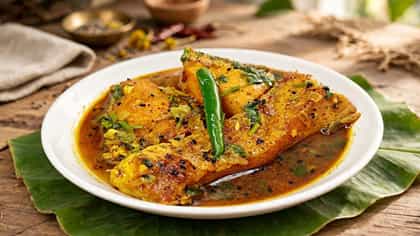 চারাপোনা দিয়ে বানিয়ে ফেলুন ওপার বাংলার বিখ্যাত 'কাসন পোড়া ঝোল'