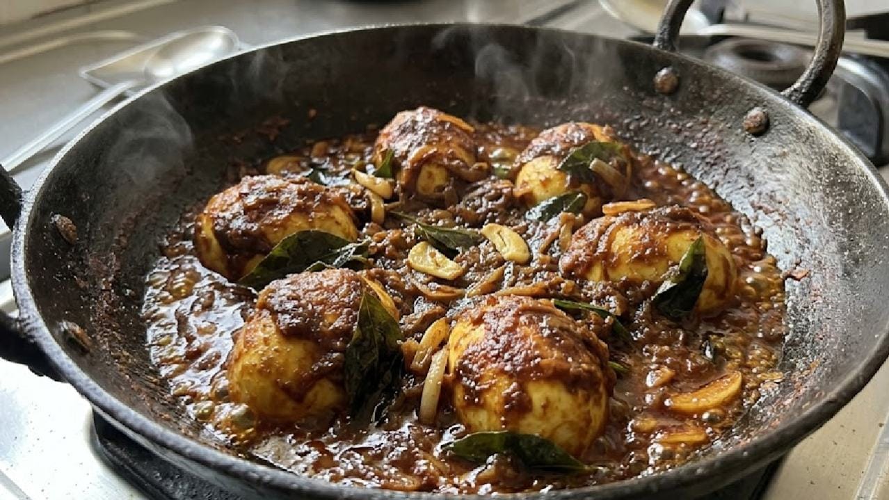 মশলার সঙ্গে ডিমের টুকরোগুলোকে খুব সুন্দরভাবে মিশিয়ে নিয়ে আরও কিছুক্ষণ মাঝারি আঁচে রান্না হতে দিন। এই পর্যায়ে খাঁটি ঘিয়ের কারণে রান্নার ওপর একটি চকচকে সুন্দর আস্তরণ তৈরি হবে যা দেখলেই আপনার খিদে বেড়ে যাবে। কারি পাতা, রসুন আর কাঁচা লঙ্কার ঝাঁঝালো স্বাদ এই সময় ডিমের সঙ্গে একেবারে মিলেমিশে একাকার হয়ে উঠবে। Ai Genareted